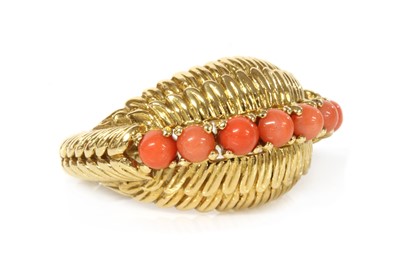 Lot 188 - A gold coral set bracelet and ring suite, by Cartier Paris
