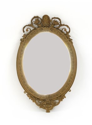 Lot 273 - An Edwardian giltwood and composition mirror