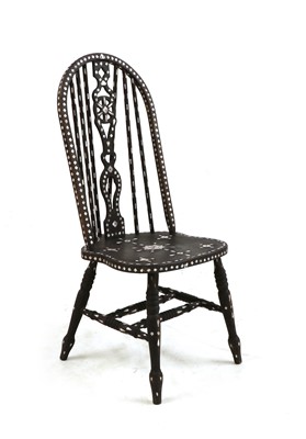 Lot 198 - A stained and mother of pearl inlaid wheel back Windsor-style single chair