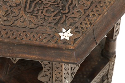 Lot 968 - A Syrian carved hardwood and mother-of-pearl inlaid occasional table