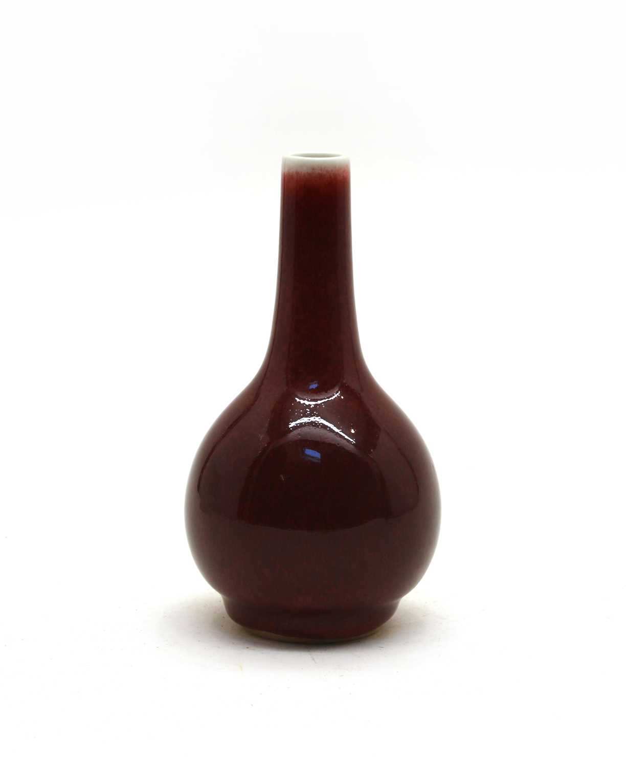 Lot 97 - A Chinese red-glazed vase