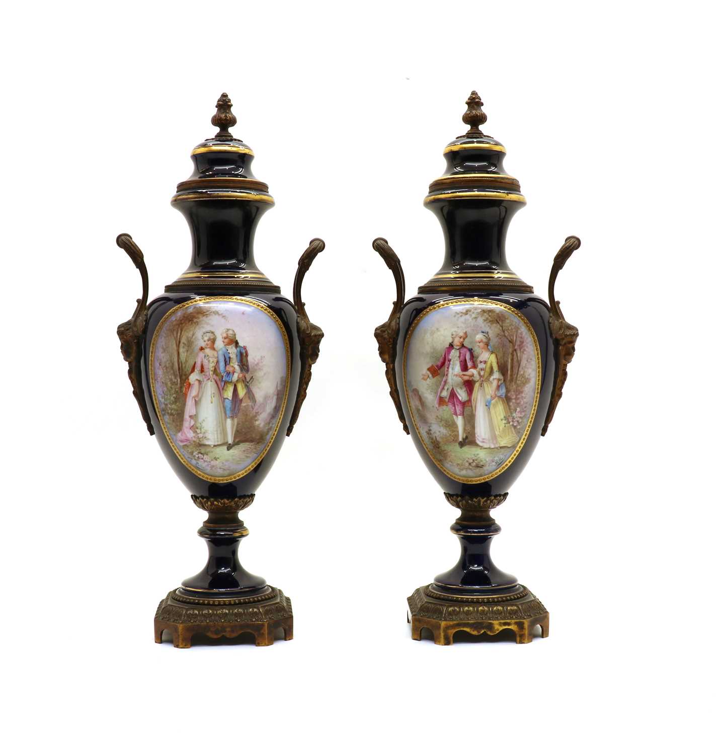 Lot 48 - A pair of French Sevres-style porcelain and gilt-metal mounted vases and covers