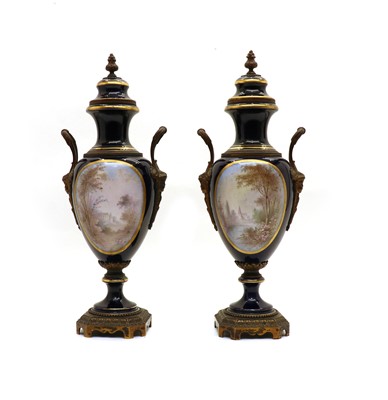 Lot 48 - A pair of French Sevres-style porcelain and gilt-metal mounted vases and covers