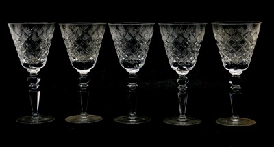 Lot 134 - A set of ten moulded and cut glass wine goblets