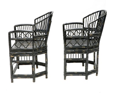 Lot 943 - A pair of 'Brighton Pavilion' ebonised bamboo elbow chairs