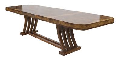Lot 172 - An Art Deco burr walnut dining table
