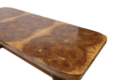 Lot 172 - An Art Deco burr walnut dining table