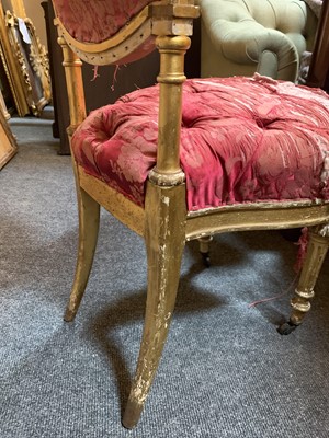 Lot 205 - A set of four giltwood single chairs