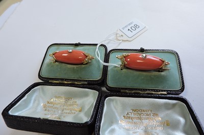Lot 108 - A pair of cased Victorian coral and diamond brooches