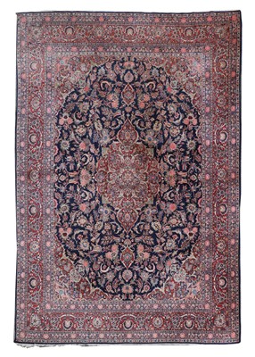 Lot 593 - A Persian Kashan carpet