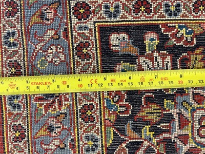 Lot 602 - A Persian wool and silk Kashan carpet