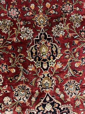 Lot 602 - A Persian wool and silk Kashan carpet