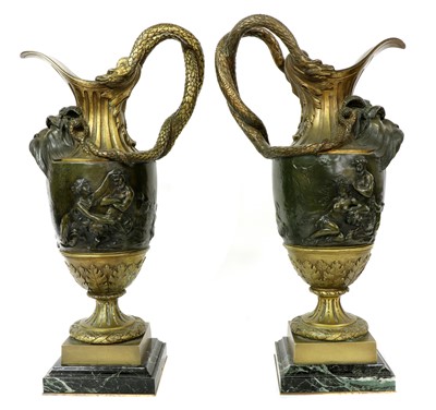 Lot 481 - A pair of large gilt-bronze and bronze ewers