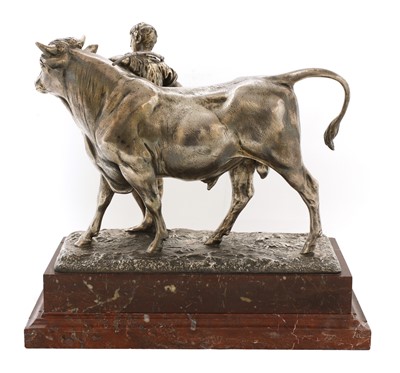 Lot 542 - A silvered bronze agricultural trophy in the form of a bull and handler