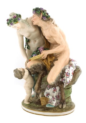 Lot 159 - A porcelain bacchanalian figure group in the manner of Meissen