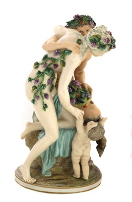 Lot 159 - A porcelain bacchanalian figure group in the manner of Meissen