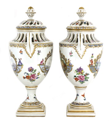 Lot 92 - A pair of Dresden urn vases and covers