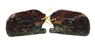 Lot 106 - A Chinese inscribed jade 'tiger' tally