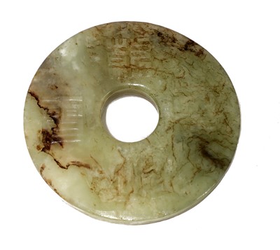 Lot 108 - A Chinese jade bi disc
