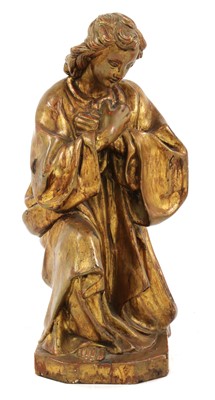 Lot 565 - A Continental carved giltwood kneeling ecclesiastical figure