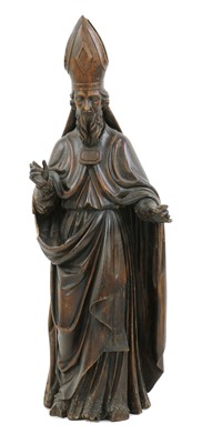 Lot 549 - A Continental carved wood figure of a bishop