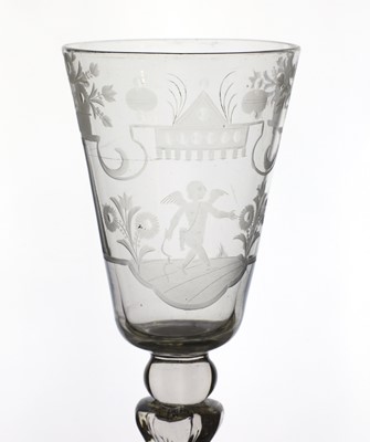 Lot 882 - An engraved glass goblet