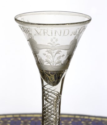 Lot 879 - A Dutch engraved friendship glass