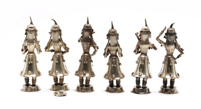 Lot 1 - Six Indian white metal musicians