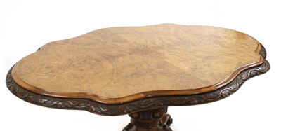 Lot 305 - A Victorian walnut breakfast table