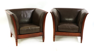 Lot 660 - A pair of Italian chocolate leather armchairs