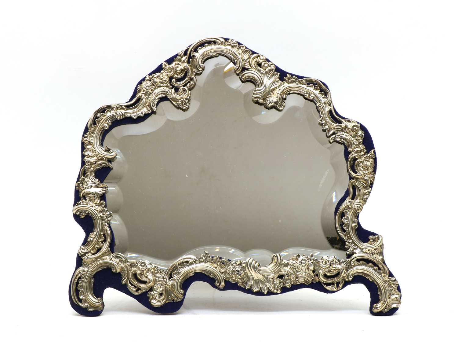Lot 35 - A silver framed dressing mirror of Rococo design