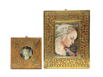 Lot 136 - Two similar teak and brass inlaid frames