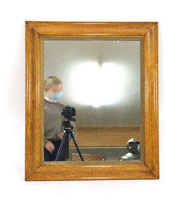 Lot 314 - A birds eye maple framed wall mirror