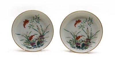 Lot 106 - A pair of Chinese famille rose saucers