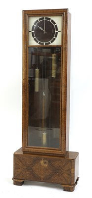 Lot 166 - An Art Deco walnut longcase clock