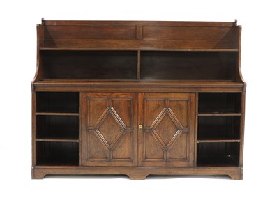 Lot 472 - An Arts and Crafts oak bookcase