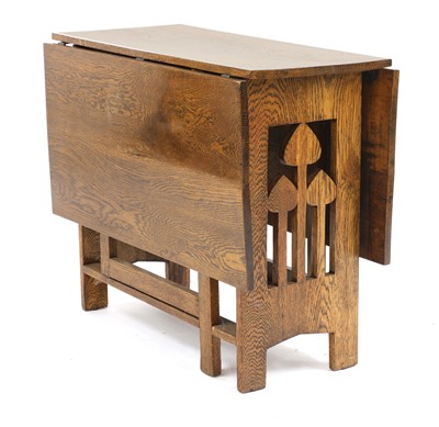 Lot 56 - An Arts and Crafts oak gateleg table