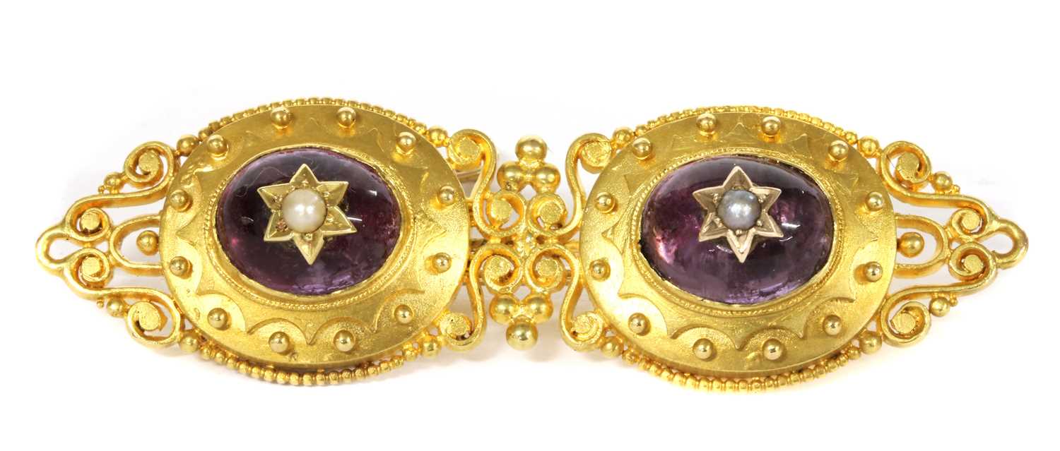 Lot 2 - A gold amethyst and split pearl brooch