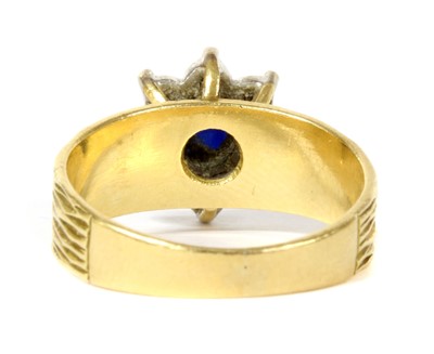Lot 138 - A gold sapphire and diamond flower cluster ring, c.1980