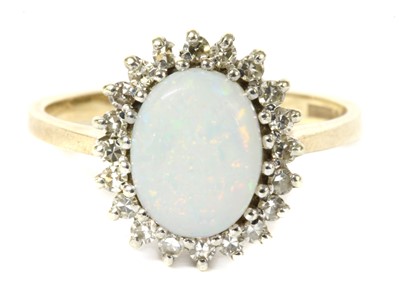 Lot 202 - A 9ct gold opal and diamond cluster ring