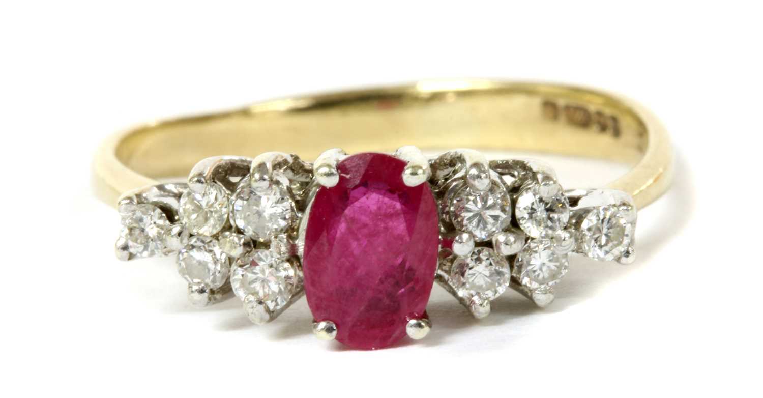 Lot 110 - A 9ct gold ruby and diamond eleven stone ring