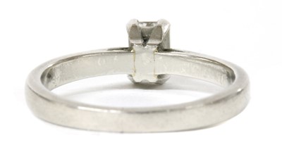 Lot 112 - A platinum single stone emerald cut diamond ring