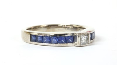 Lot 130 - An 18ct white gold diamond and sapphire ring, by Mappin & Webb