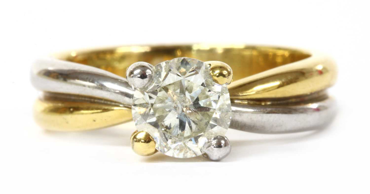 Lot 41 - An 18ct two colour gold single stone diamond ring
