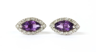 Lot 167 - A pair of 9ct white gold amethyst and diamond halo cluster earrings