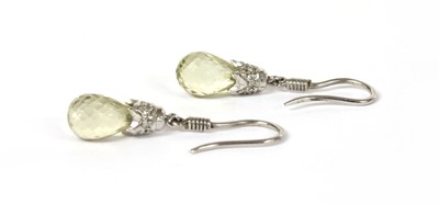 Lot 199 - A pair of white gold lemon quartz and diamond drop earrings