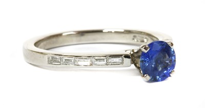 Lot 127 - A platinum sapphire and diamond ring