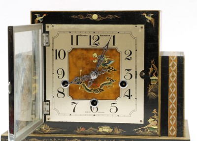 Lot 88 - A black lacquered mantel clock