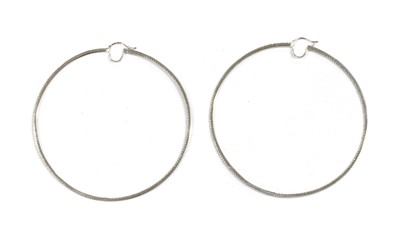 Lot 407 - A pair of large white gold diamond set hoop earrings