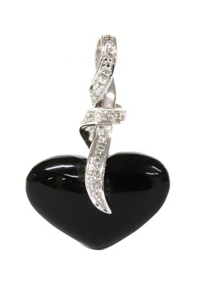 Lot 179 - A white gold onyx and diamond heart pendant
